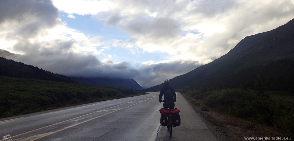 Cycling from Columbia Icefield via Saskatchewan River Crossing to Lake Louise.  Icefields Parkway by bicycle. 