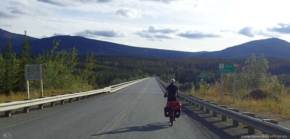Teslin River Bridge. British Columbia and Yukon by bicycle: Cycling the Cassiar Highway and Alaska Highway northbound. Stage from Morley Lake up to Johnsons Crossing.   